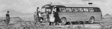 Internees arriving by bus to Manzanar. Photo courtesy of Yoshiko Hosoi.